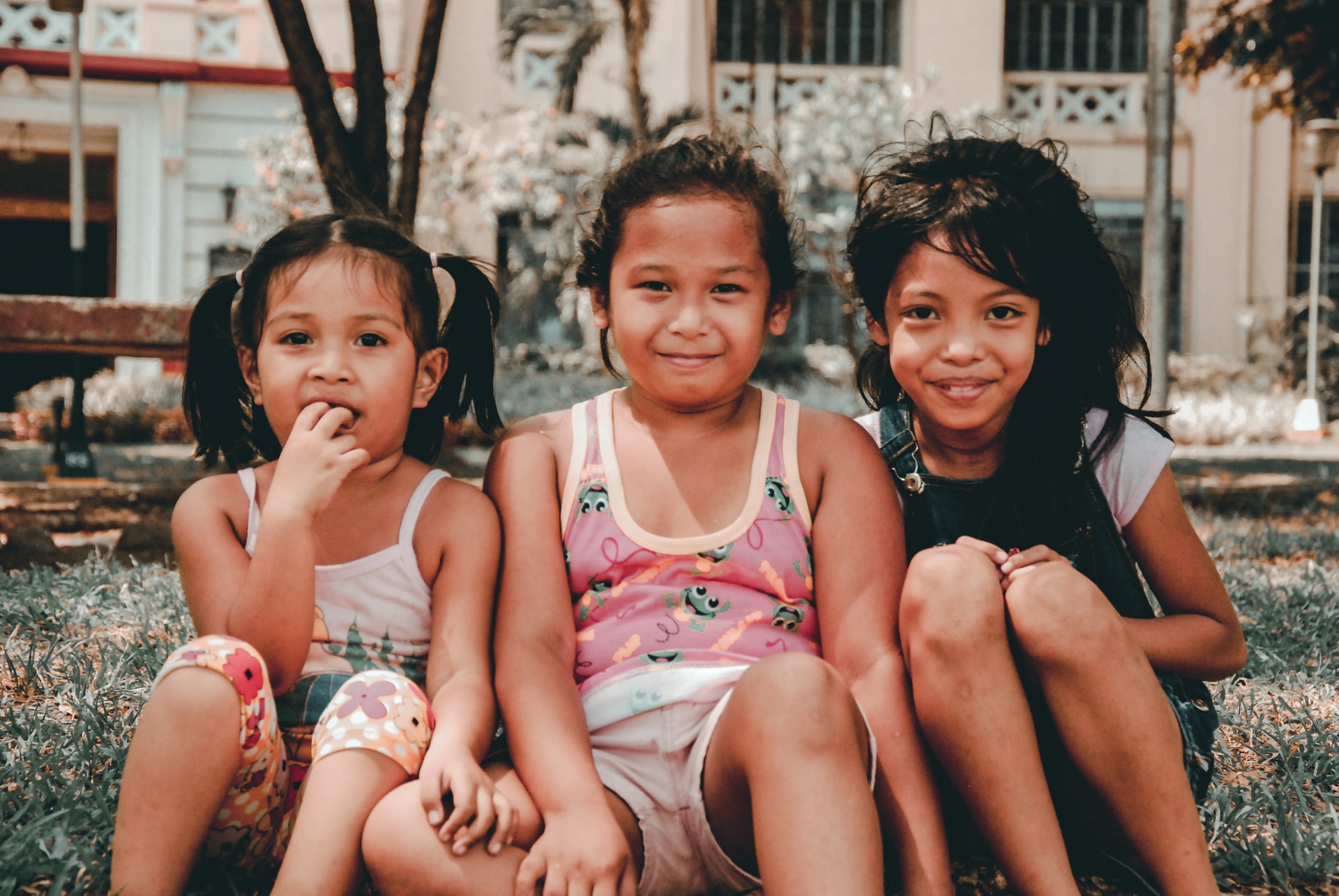 3 Children sitting in the Philippines